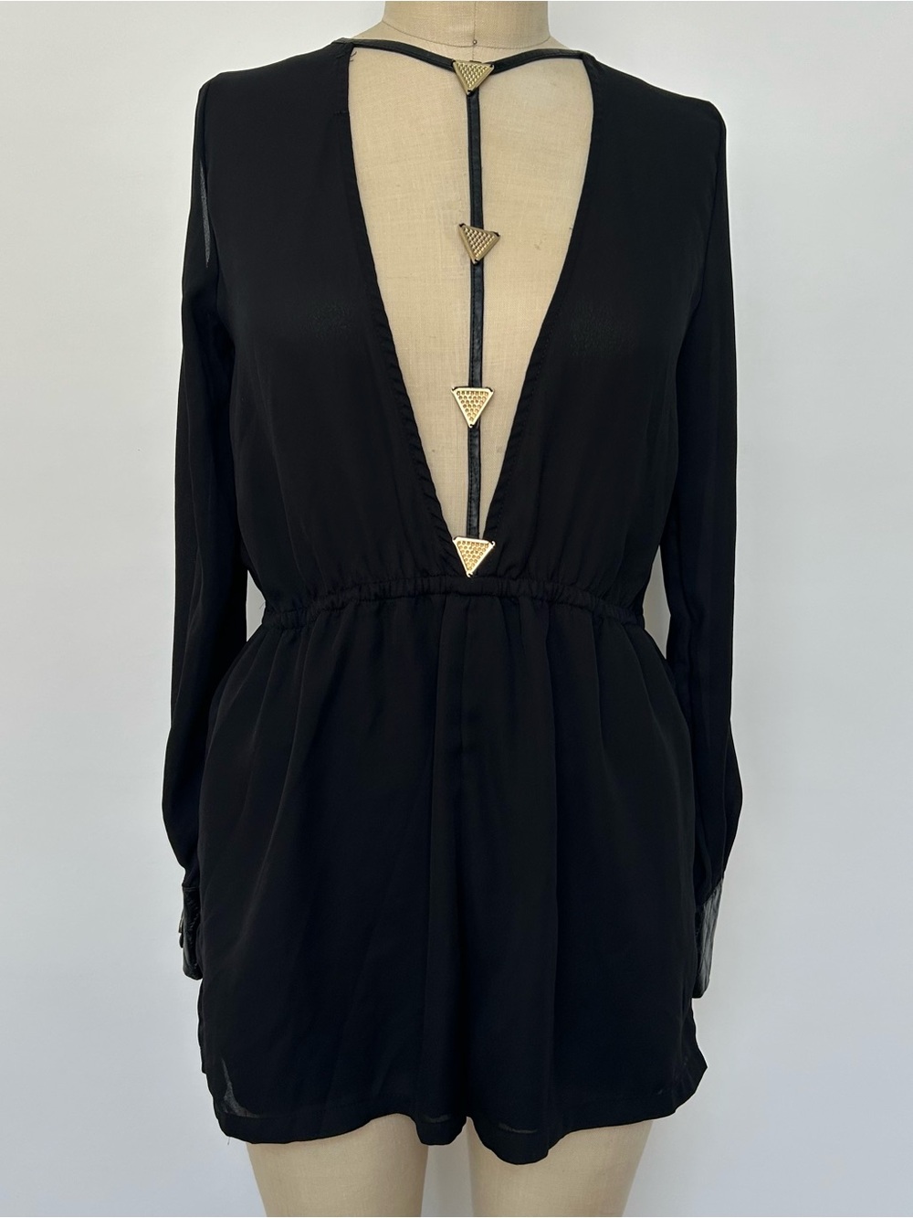 Black Long-Sleeve Deep V Romper with Gold Triangle Accent